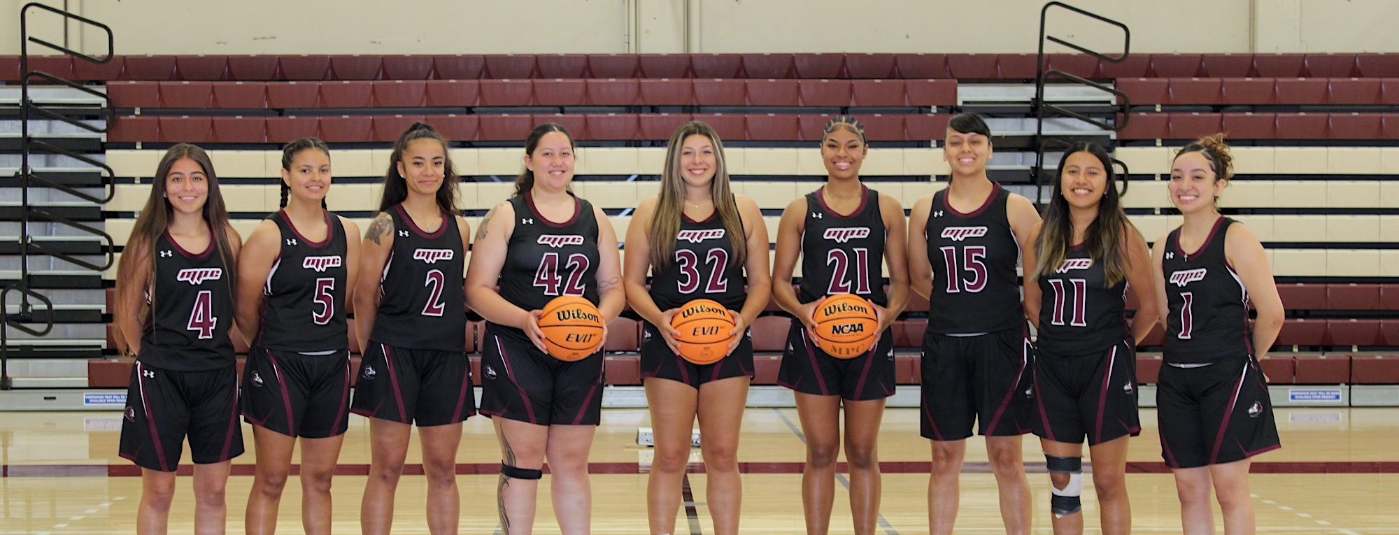 MPC Women's Basketball Team Posing for Group Photo